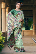 Pista Green Patola Silk Blend Saree With Blouse Piece