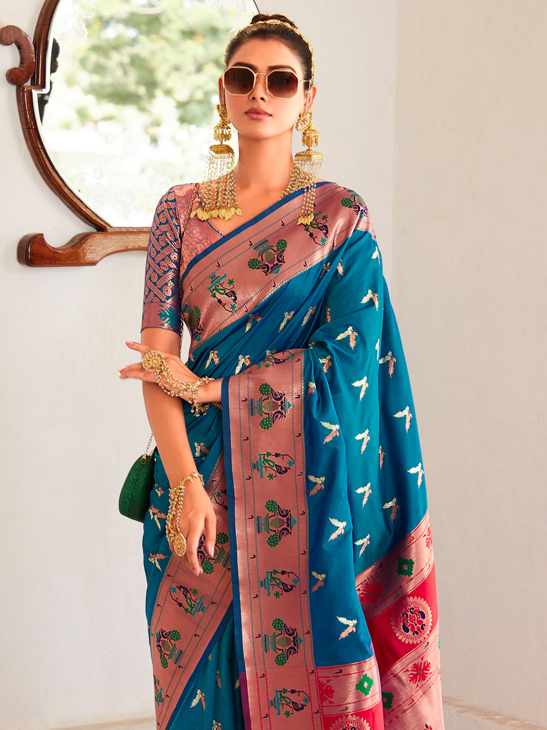 Cerulean Blue Paithani Silk Saree With Peacock Border