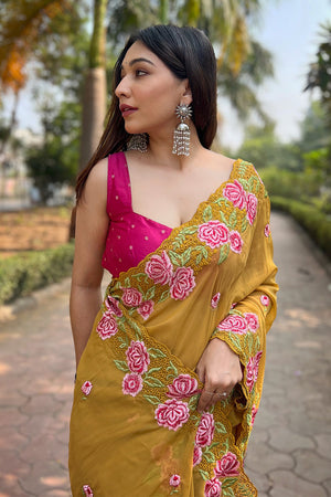 Yellow Georgette Saree with Pink Blouse Piece