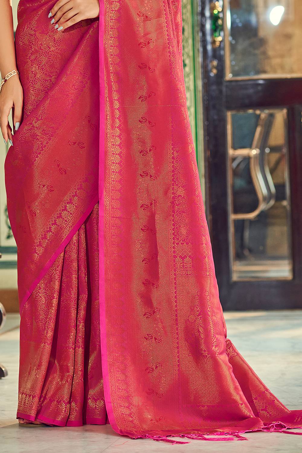 Rani pink color soft kanchipuram silk saree with zari weaving work