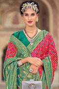 Pink And Green Patola Saree