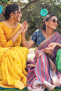 yellow leheriya saree