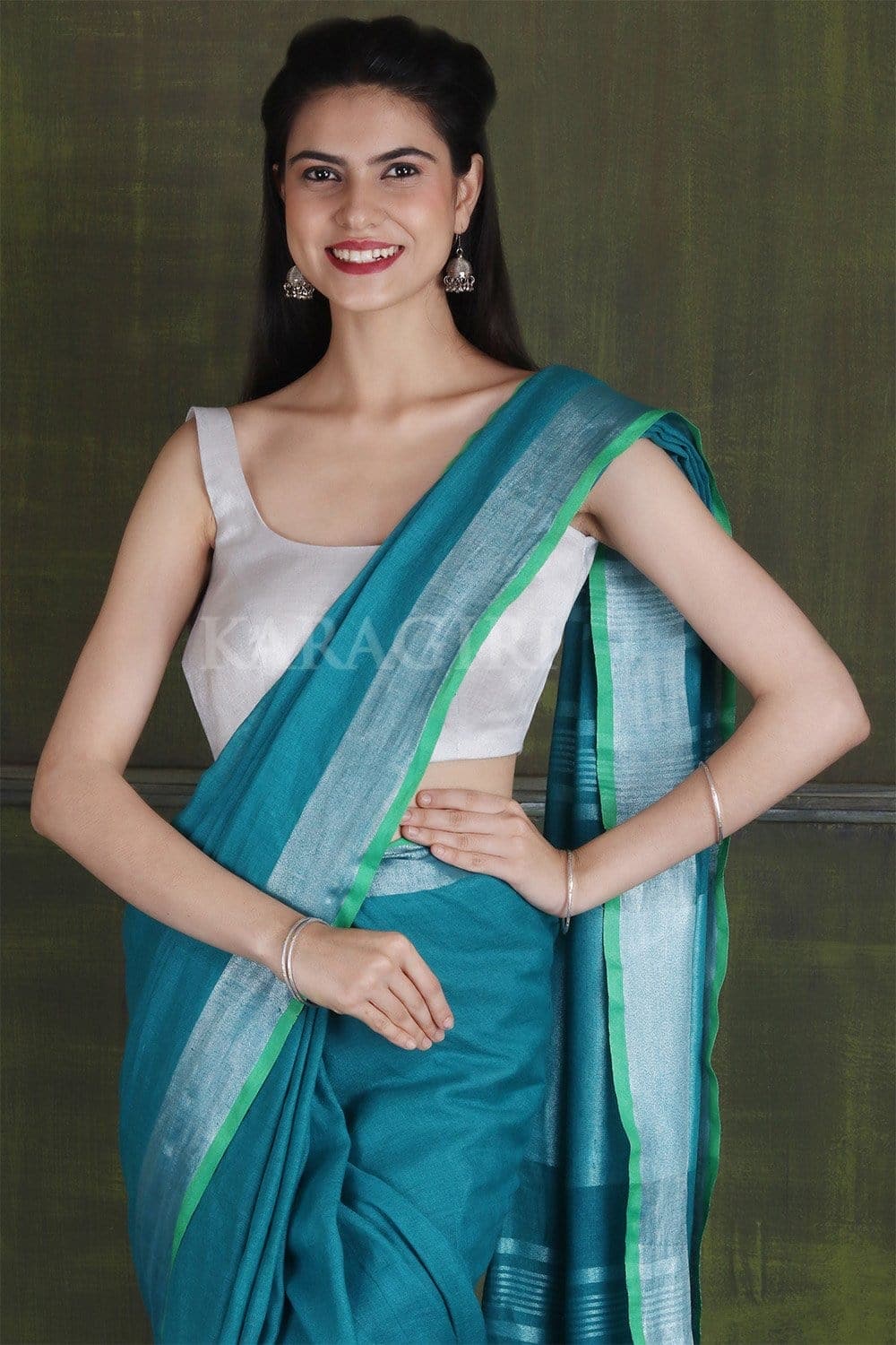 Metallic Green Dualtone Tissue Linen Saree With Woven Designs - ROOPKATHA -  2955160