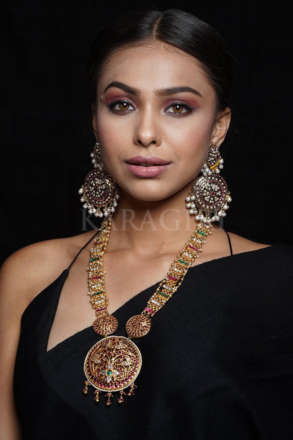 Viranica Manchu in a polki diamond long necklace and earrings set