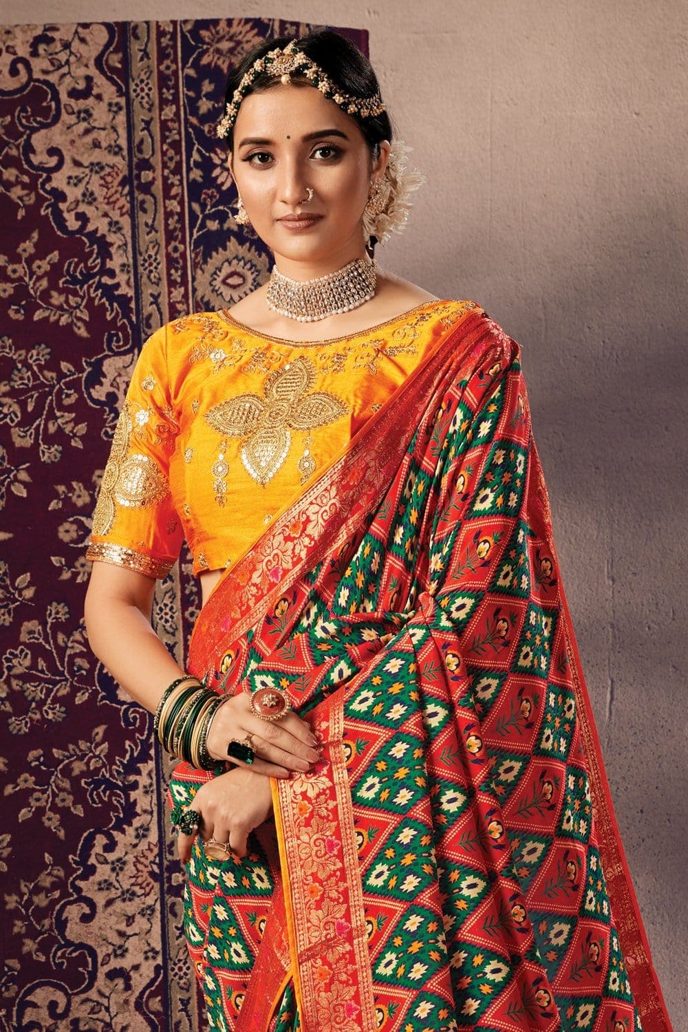 Buy Gorgeous red,green woven patola saree online at best price - Karagiri